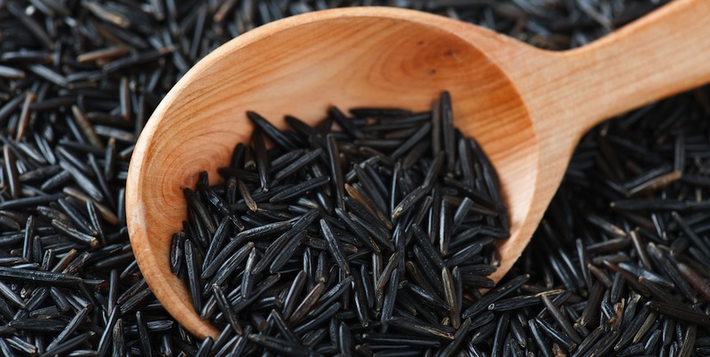 Top view of Wild Rice In Wooden Spoon ** Note: Shallow depth of field